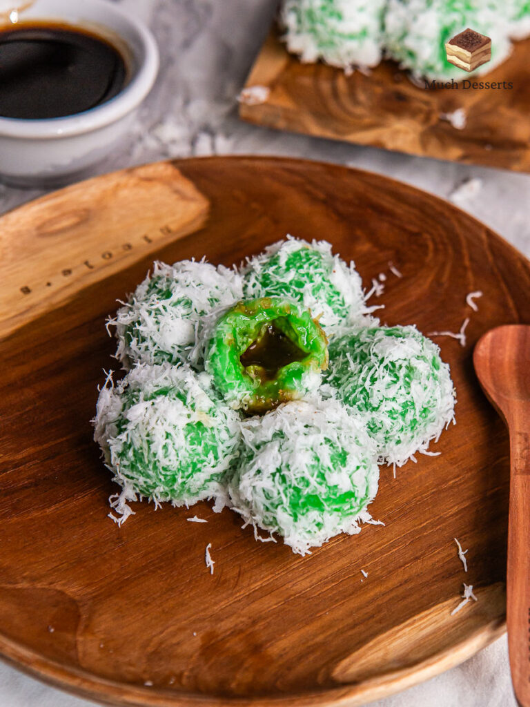 Klepon is a delicious twist on the Indonesian dessert, featuring pandan glutinous rice,coconut sugar filling, and coconut coating.