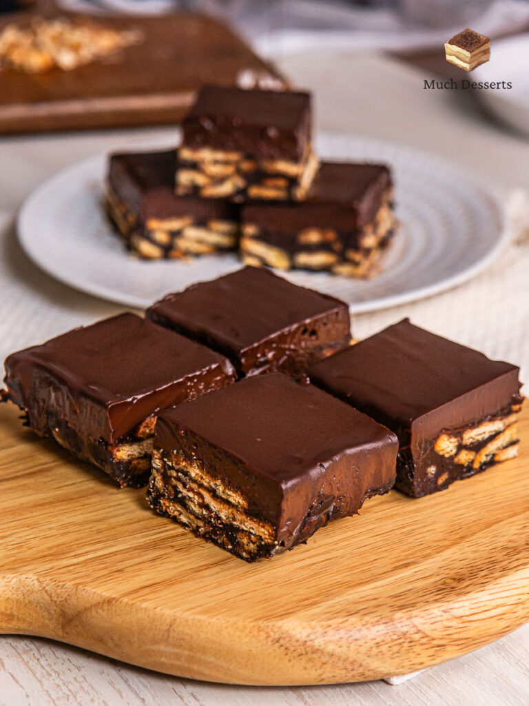 Make this super easy Malaysian kek batik with chocolate ganache. features layers of chocolate and biscuits, topped with a luscious chocolatey