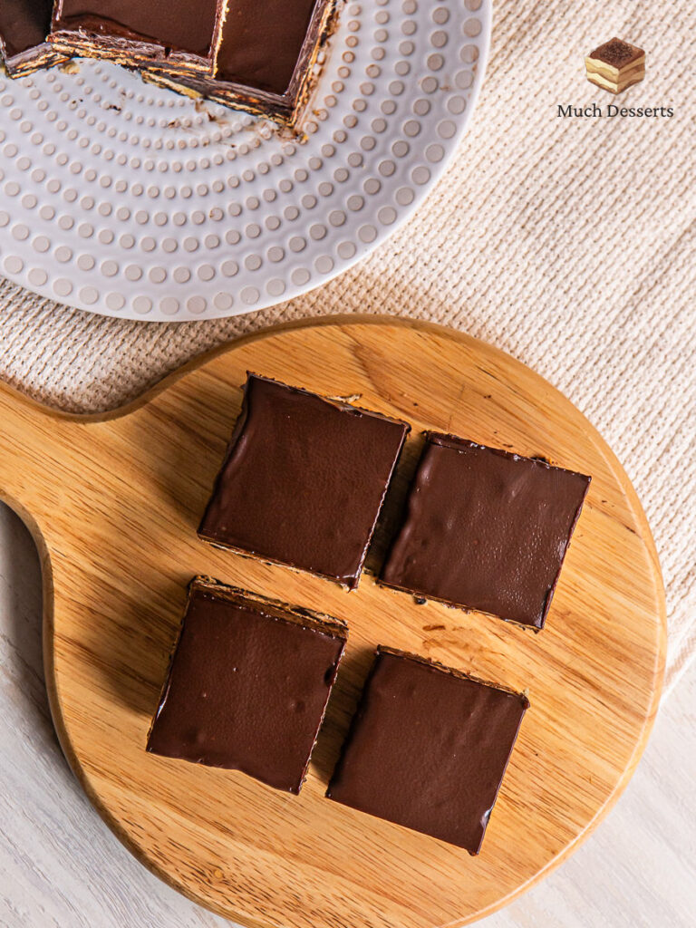 Make this super easy Malaysian kek batik with chocolate ganache. features layers of chocolate and biscuits, topped with a luscious chocolatey