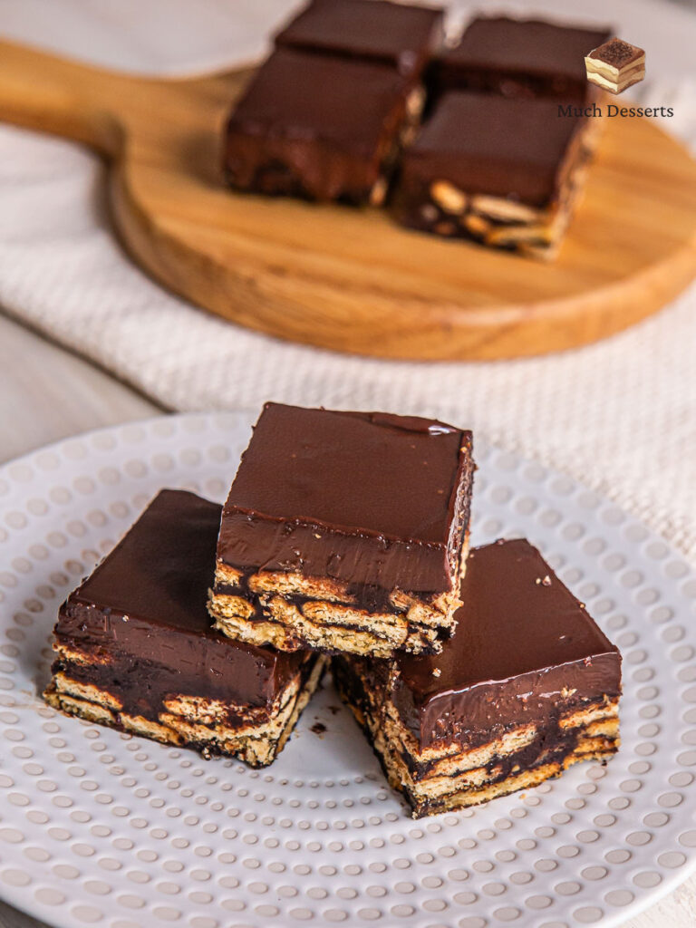 Make this super easy Malaysian kek batik with chocolate ganache. features layers of chocolate and biscuits, topped with a luscious chocolatey